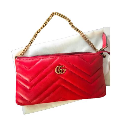 gucci monogram clutch red leather|gucci clutch bag price list.